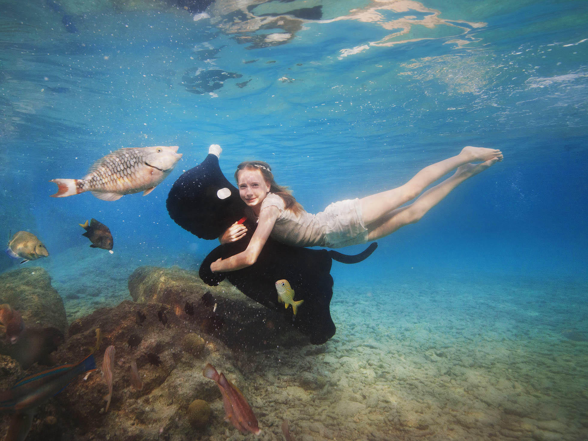 underwater photo with kids on bonaire